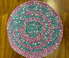Angie's table mat made from a stuffed jelly roll strip
