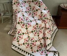 Jenny B's quilt with applique flowers, made for a friend
